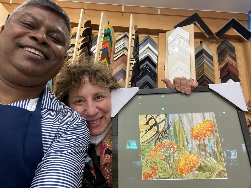 Gallery wall of framed art